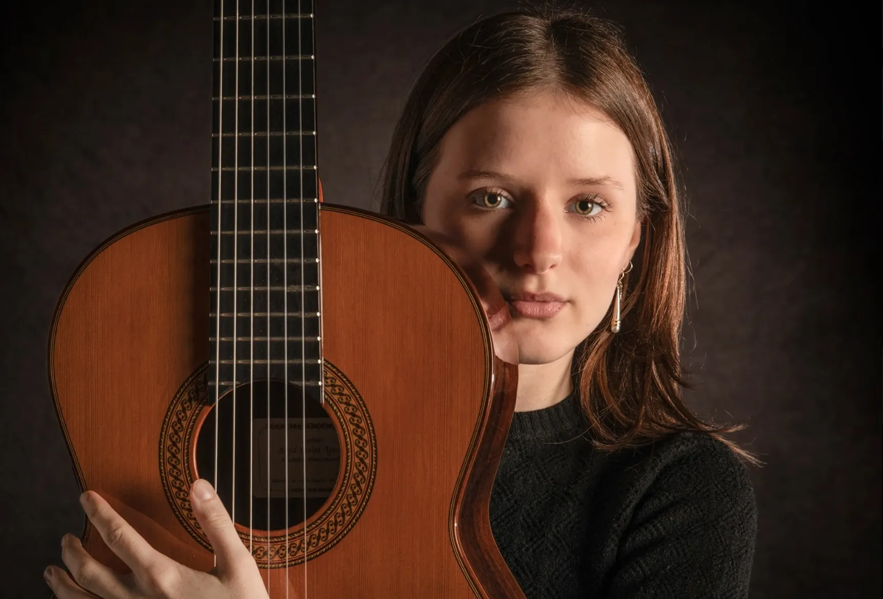 Ruby Cheyne with her guitar